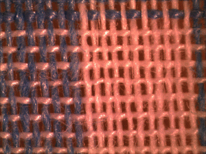 Optical image of low quality cotton fabric.  The lower thread count per inch is apparent.