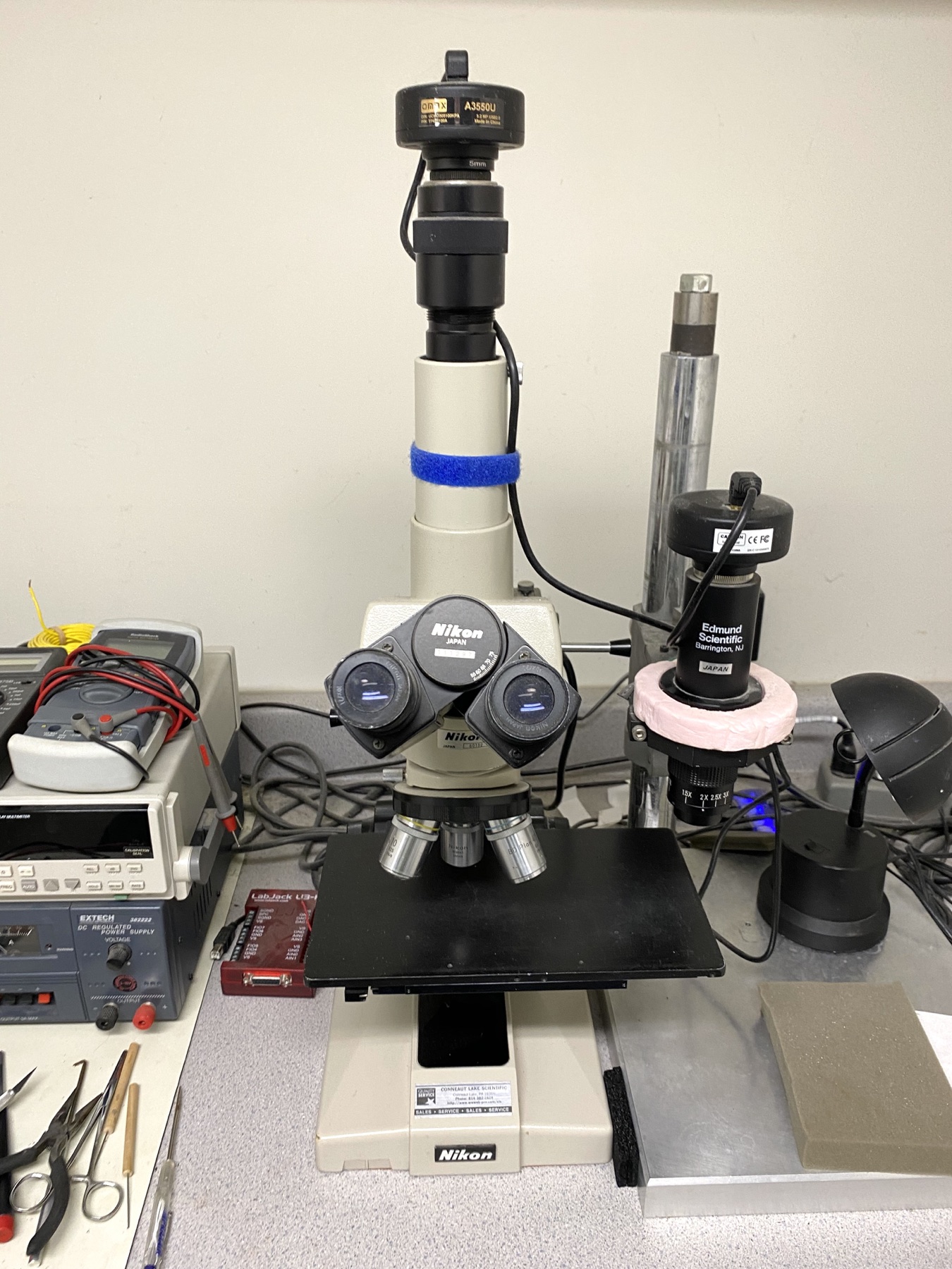 Nikon Optiphot microscope and separate video zoom optical system positioned side by side