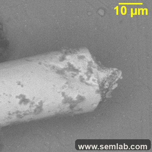 Fused-open bond wire after current overstress