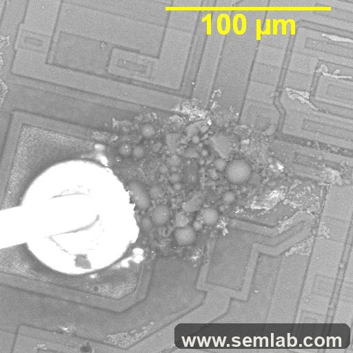 IC die-level EOS damage near output metallization