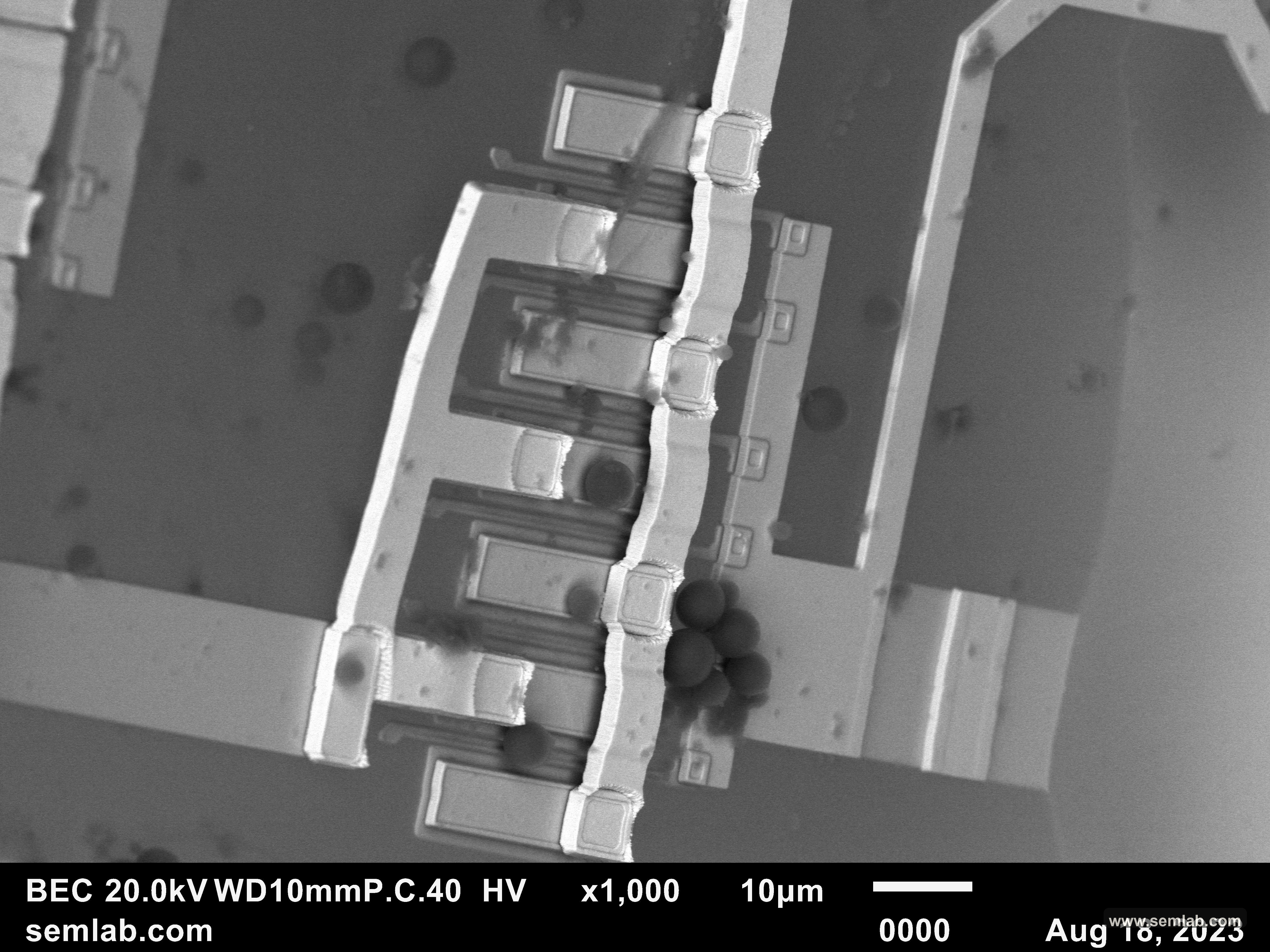 Under-part conductive geometry associated with an ionic leakage path