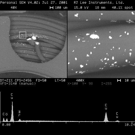 SEM and EDS image showing copper-rich debris around failed magnet wire