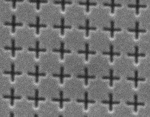 Electron beam lithography produced a pattern of gold on quartz.Feature width is 30 nm. (20,000X SEI 5KeV) (Sample courtesy of EDTEK, Inc., Kent, WA)