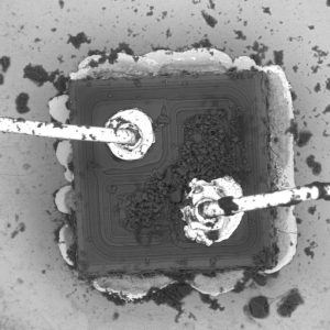 Transistor failure caused by electrical overstress damage across most of the emitter region of the die.